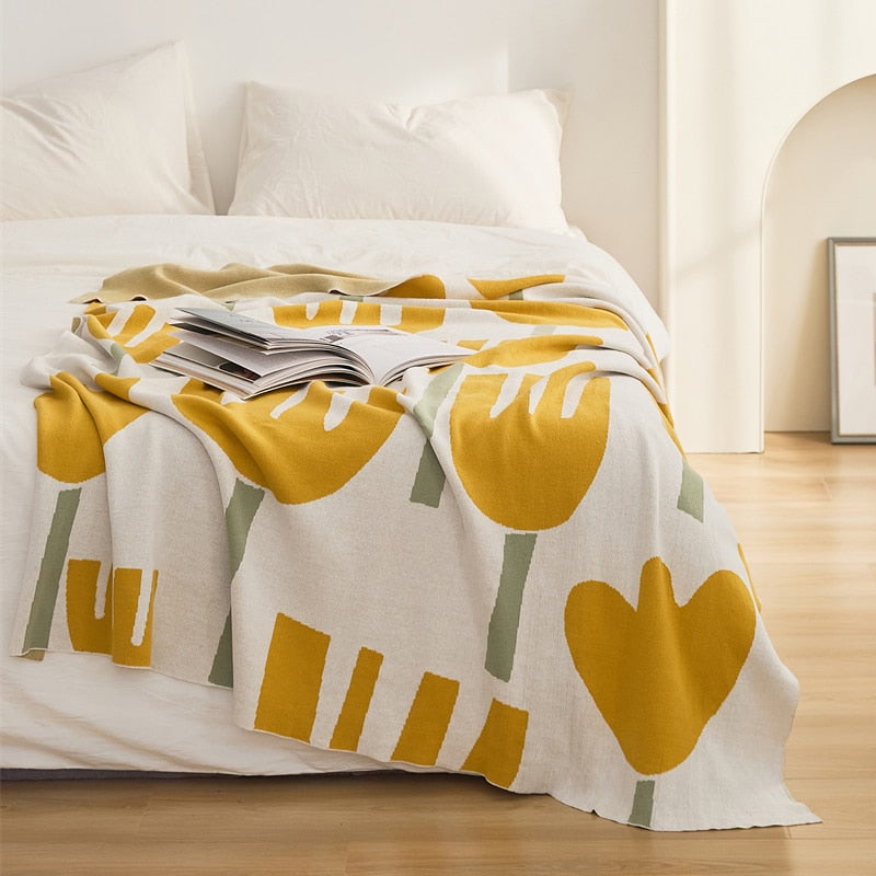 Sweet knitted yellow and beige rectangular 100% cotton tulip and dandelion throw blanket in yellow or orange for your kids or baby's bedroom. Size: 50 x 62 inches (130 x 160 inches)