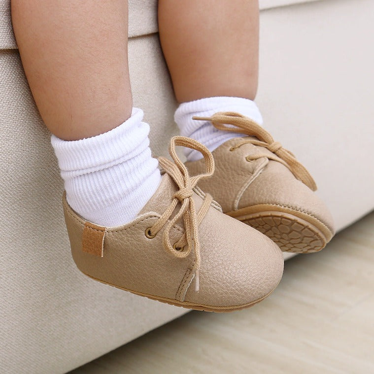 Rubber sole anti-slip first walkers leather beige shoes for baby and toddlers age Infant Newborn to 18 months.