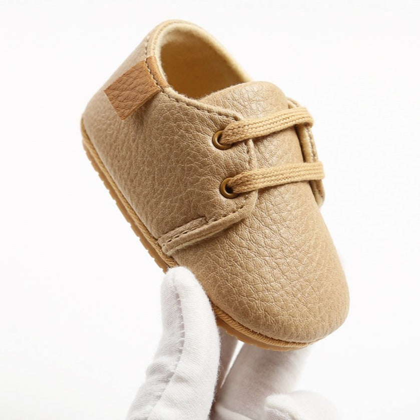 Rubber sole anti-slip first walkers leather beige shoes for baby and toddlers age Infant Newborn to 18 months.