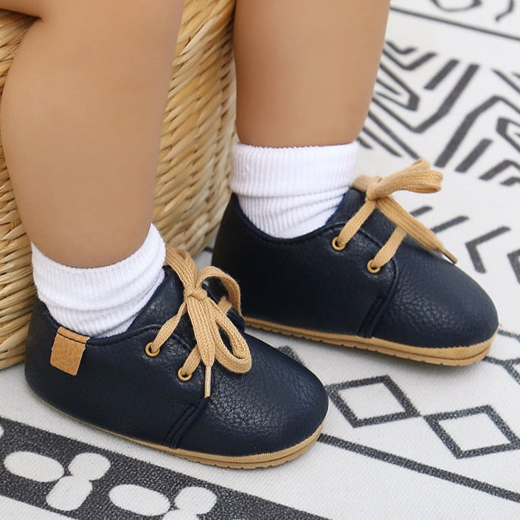 Rubber sole anti-slip first walkers black leather shoes for baby and toddlers age Infant Newborn to 18 months.