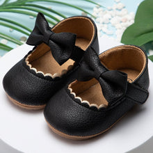 Load image into Gallery viewer, Sweet black leather ribbon shoes for your first time walker or to fit that beautiful party dress. These shoes are for baby girls and toddlers ages newborn to 18 months. Free shipping
