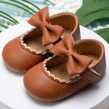 Load image into Gallery viewer, Sweet brown leather ribbon shoes for your first time walker or to fit that beautiful party dress. These shoes are for baby girls and toddlers ages newborn to 18 months. Free shipping
