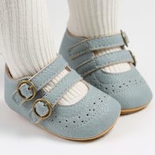 Load image into Gallery viewer, These light blue leather shoes are perfect for your first time crawler and walker. These soft sole shoes are for baby girls ages 0 to 18 months old girl. Free shipping.
