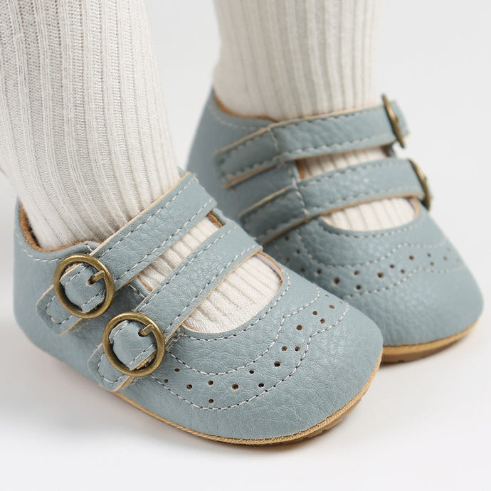 These light blue leather shoes are perfect for your first time crawler and walker. These soft sole shoes are for baby girls ages 0 to 18 months old girl. Free shipping.