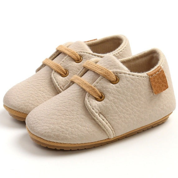 Rubber sole anti-slip first walkers beige leather shoes for baby and toddlers age Infant Newborn to 18 months.