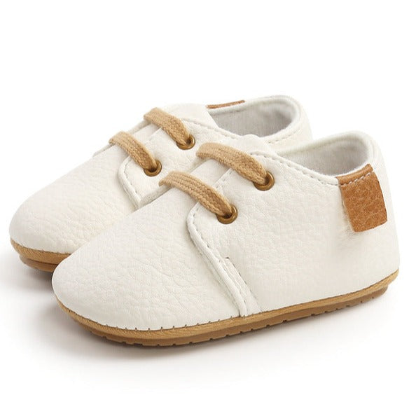 Rubber sole anti-slip first walkers white leather shoes for baby and toddlers age Infant Newborn to 18 months.